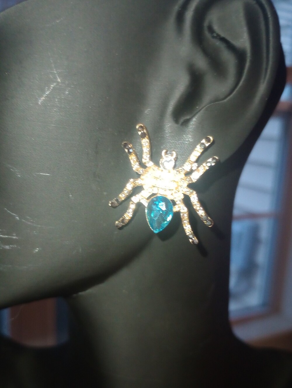 Gold Spider Statement Earrings with Blue Teardrop Stone